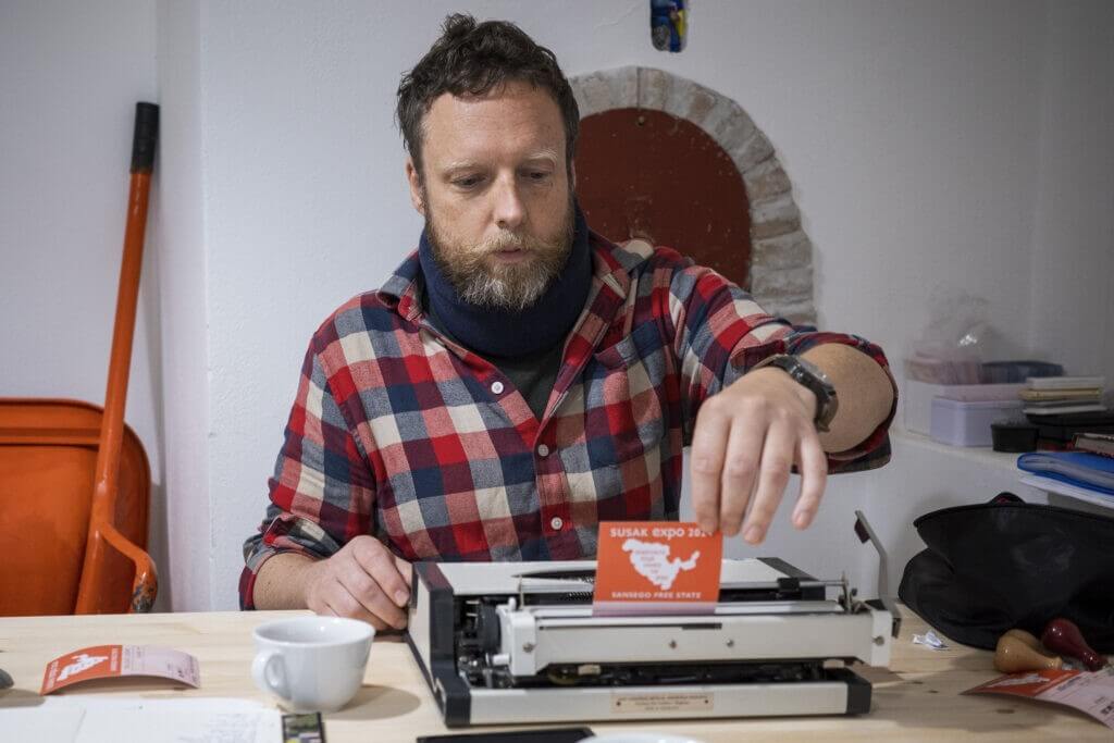 Aleš Suk working in the Susak expo 2024 office.